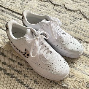 Women Nike leopard court vision low
